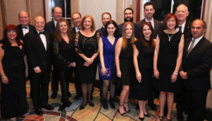 Dan Patterson, NC president (back row far left), and John F.T. Scott, chair of NC’s Board of Governors (back row second from left) thank Sharon and Keith Segal, owners of guard.me International Insurance (front row far left) and family for their $1-million donation supporting international education at Niagara College.