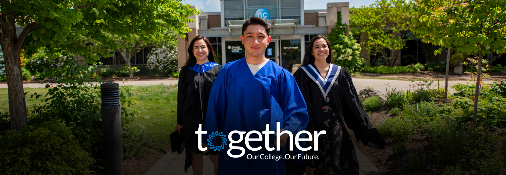 Three confident graduates striding toward the camera with greenery and NC logo in background, campaign logo: together Our College. Our Future.